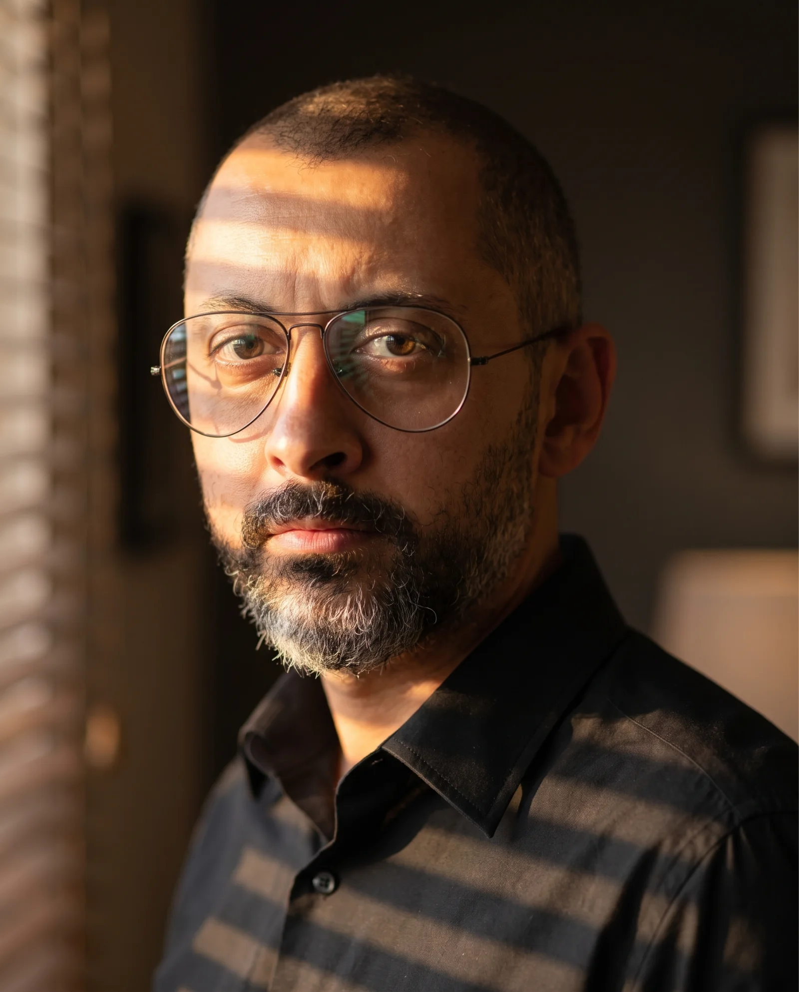 Kareem Osman in a sunlit portrait