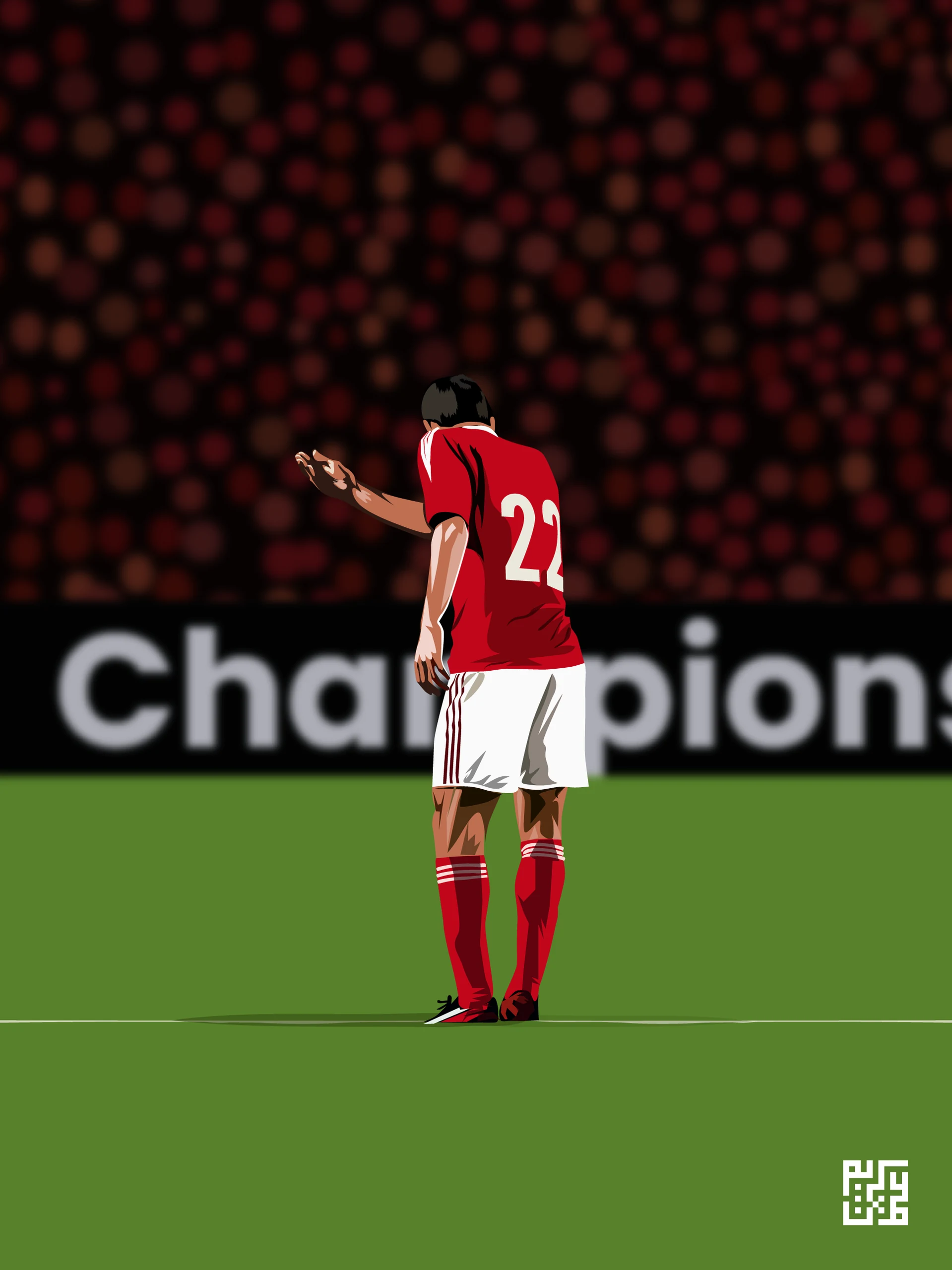 Football player in a red shirt in front of a goal